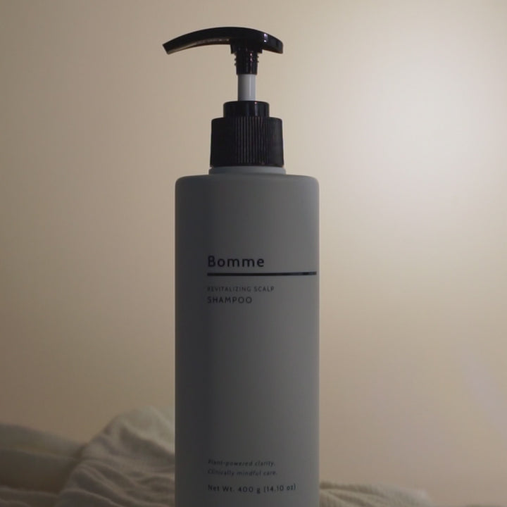 17-second brand video showing Bomme Revitalizing Scalp Shampoo, Root Renewal Supplements, and Revitalizing Scalp Toner with lifestyle product shots. Background music, no narration.